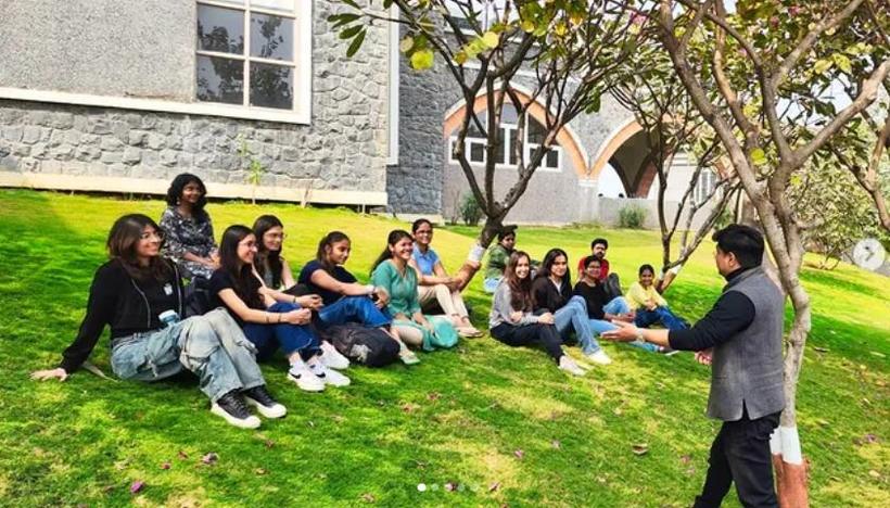 Small-group dialogue under a tree