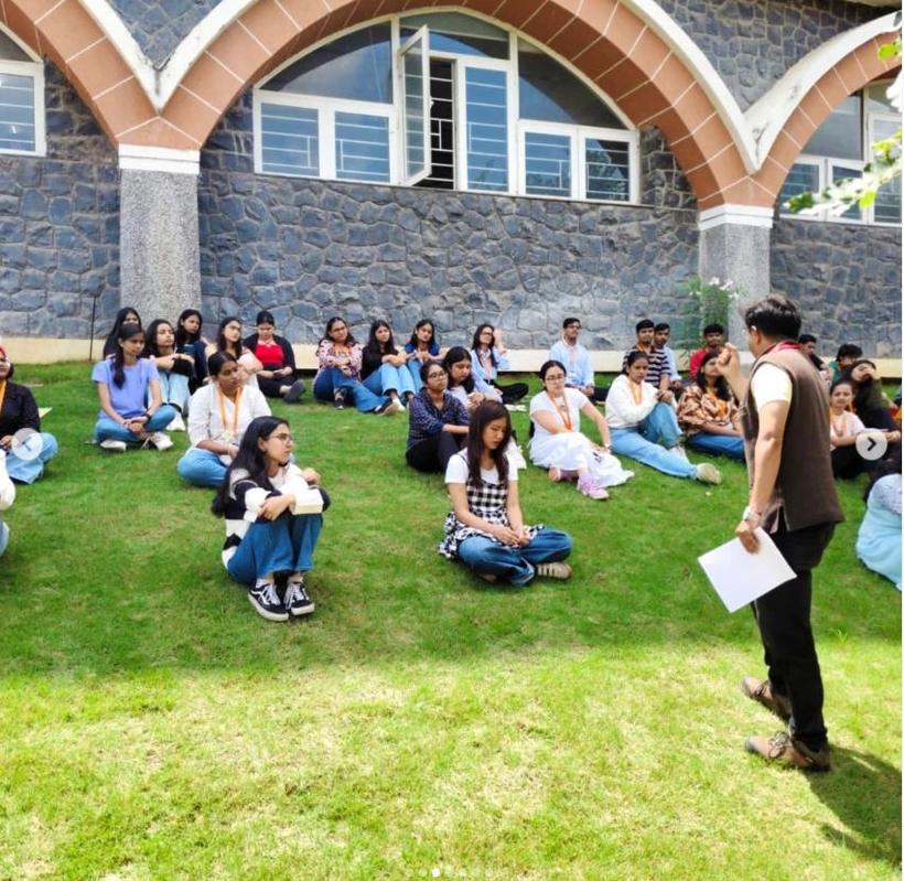 Prof. Rishi Bharadwaj teaching an open-air session on campus